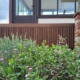 Pose d’une terrasse et d’un bardage en thermo frêne