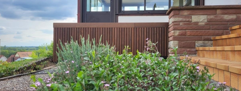 Pose d’une terrasse et d’un bardage en thermo frêne